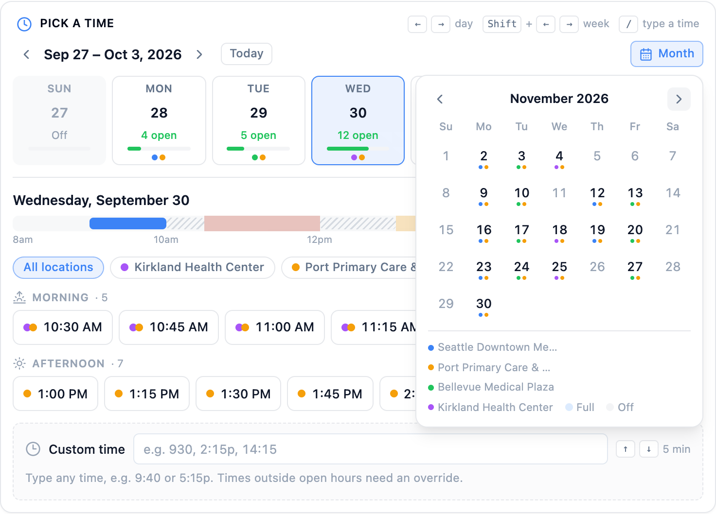 The Pick a time card with the Month calendar open on November 2026: colored location dots under each open day and weekends muted, above a legend listing the four locations, Full, and Off